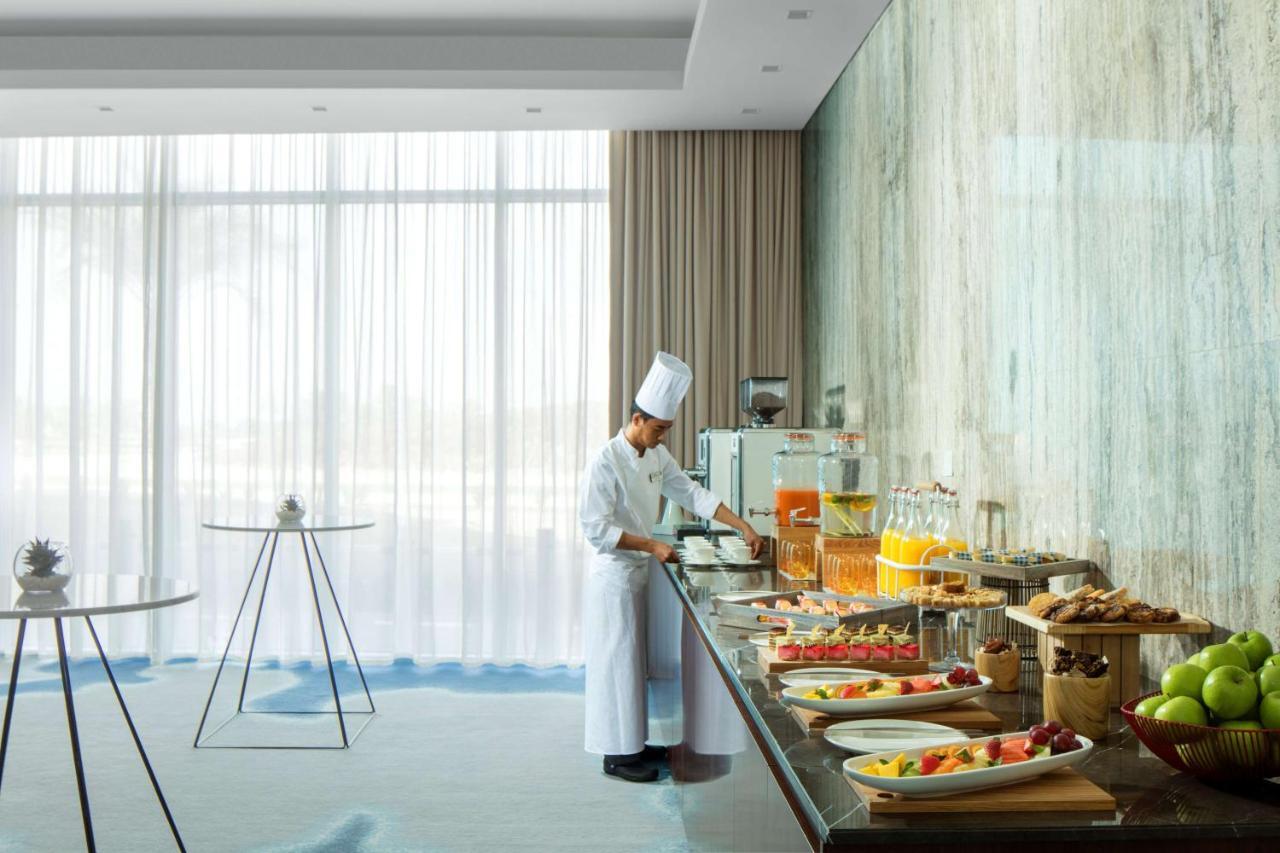 Radisson Blu Hotel Apartment Dubai Silicon Oasis Экстерьер фото