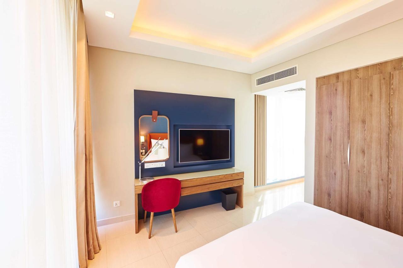 Radisson Blu Hotel Apartment Dubai Silicon Oasis Экстерьер фото