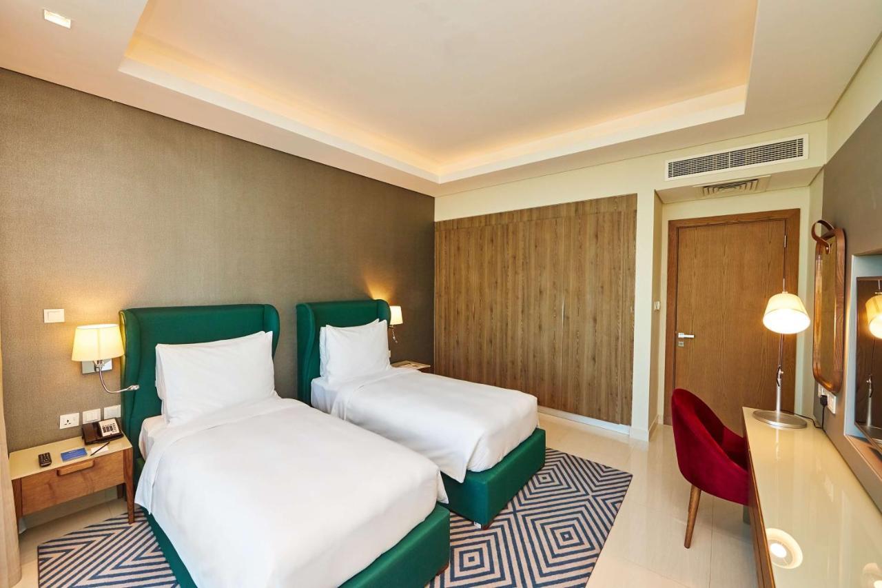 Radisson Blu Hotel Apartment Dubai Silicon Oasis Экстерьер фото