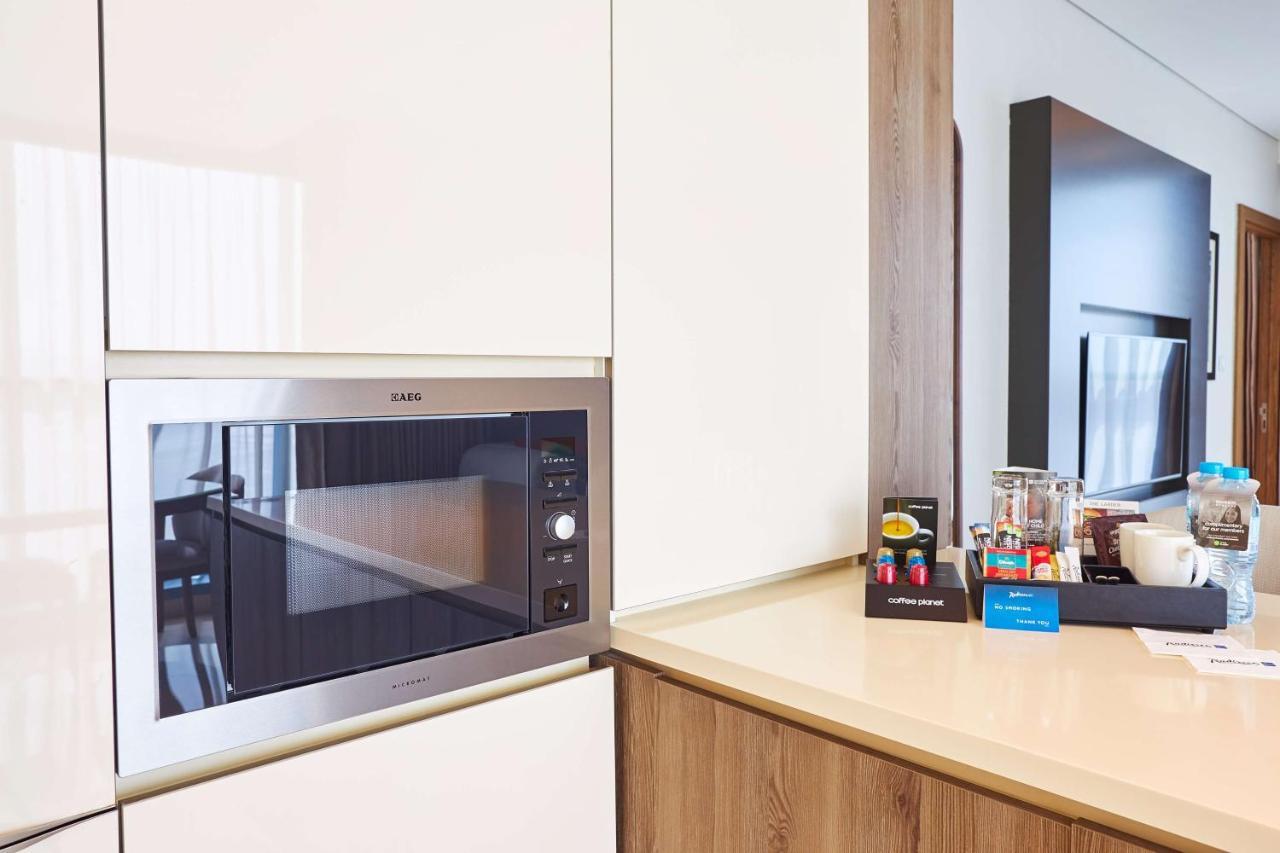 Radisson Blu Hotel Apartment Dubai Silicon Oasis Экстерьер фото